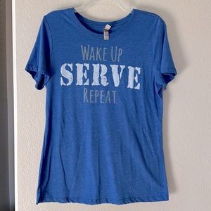 T-shirt. “WAKE UP. SERVE. REPEAT.” Size: XL  Color: royal blue